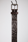 Close-up view of brown AOA belt with rivets.