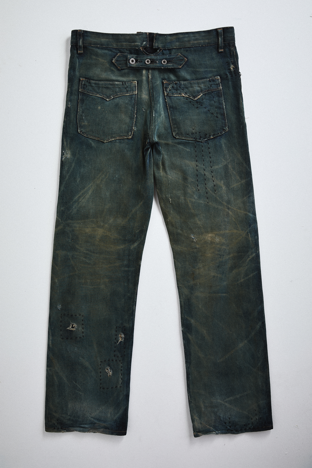Back view of distressed AOA Sashiko repaired denim