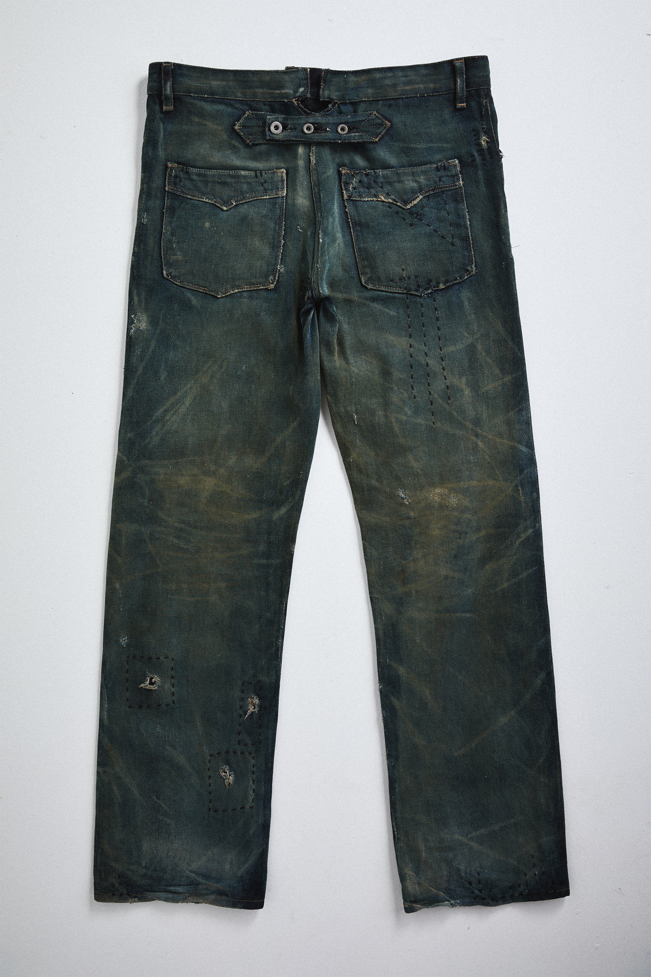 Back view of distressed AOA Sashiko repaired denim